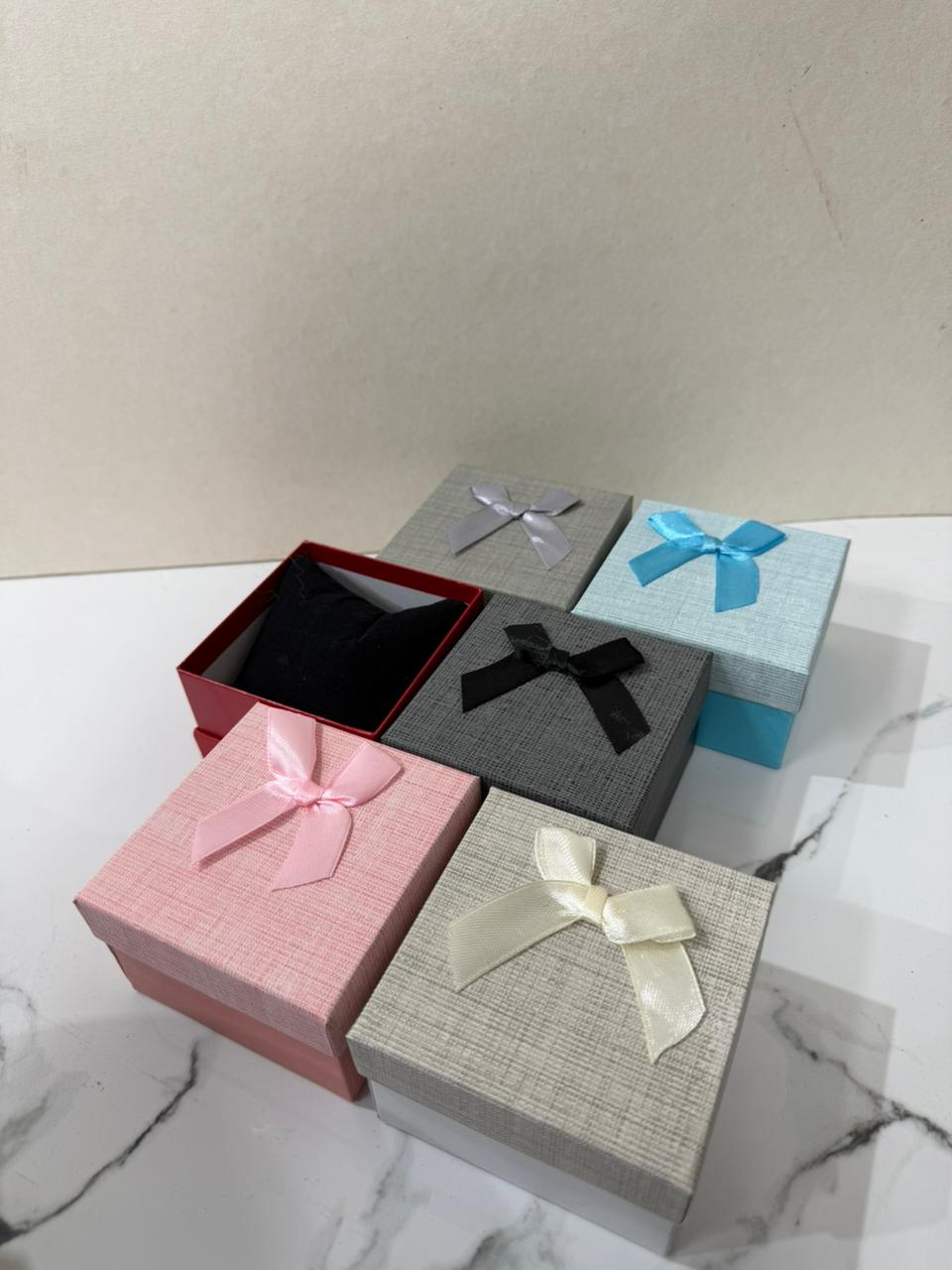 علب ساعات كرتون